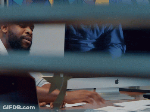 Man At Desk With Apple Computer GIF