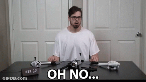 Man At Desk With Clock Saying Oh No GIF
