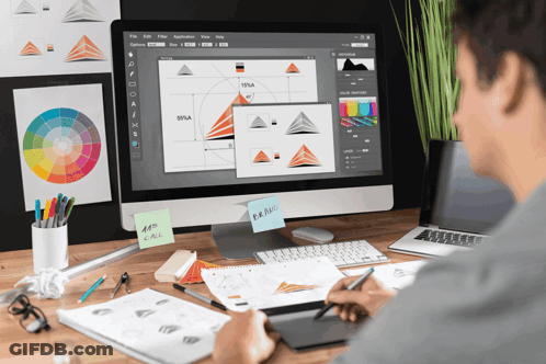 Man At Desk With Computer And Brand Sticky Note GIF