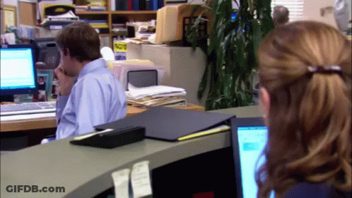 Man At Desk With Computer And Priority Mail Sign GIF