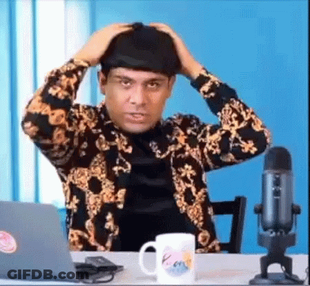 Man At Desk With Laptop And Microphone GIF