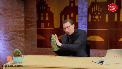 Man At Desk With Laptop And Richter Light Sign GIF