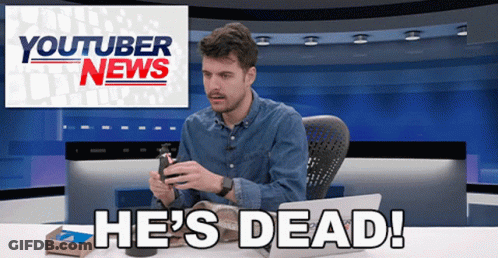 Man At Desk With Laptop And YouTuber News Sign GIF