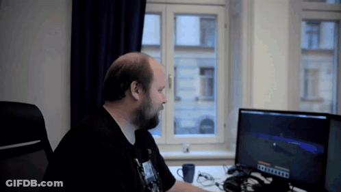 Man At Desk With Minecraft Screen GIF