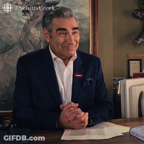 Man At Desk With Name Tag Johnny GIF