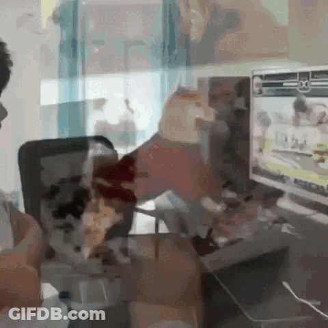 Man At Desk With NFL Screen GIF