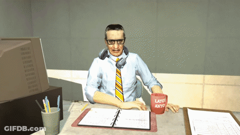 Man At Desk With Red Cup Saying Layo Anyo GIF