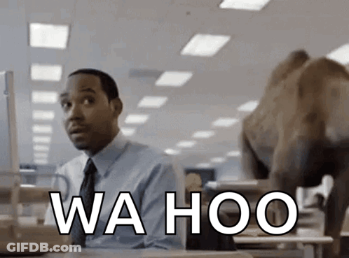 Man At Desk With Wa Hoo On Screen GIF