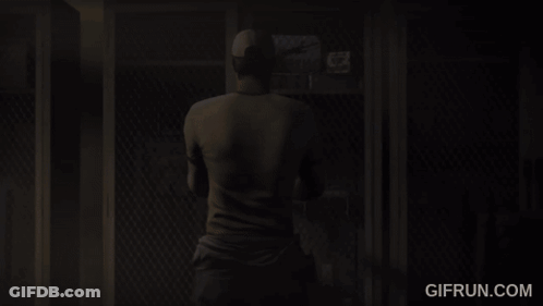 Man At Locker With Gifrun.com Logo GIF