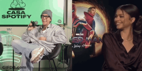 Man At Microphone Beside Spider-Man No Way Home Poster GIF