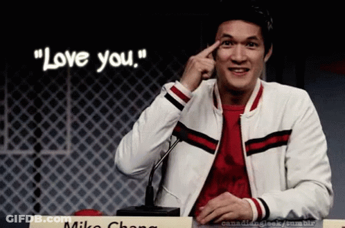 Man At Microphone Finger On Forehead Saying Love You GIF