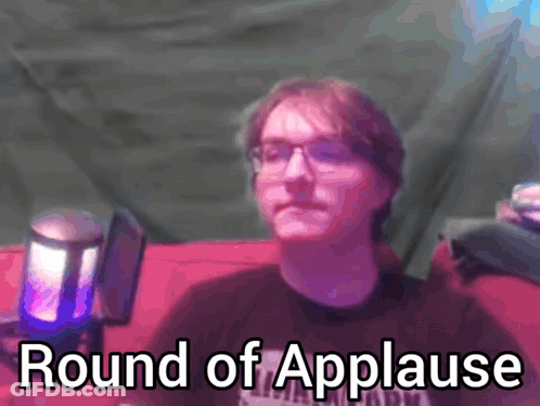 Man At Microphone Round Of Applause GIF