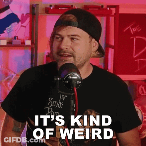 Man At Microphone Saying It's Kind Of Weird GIF