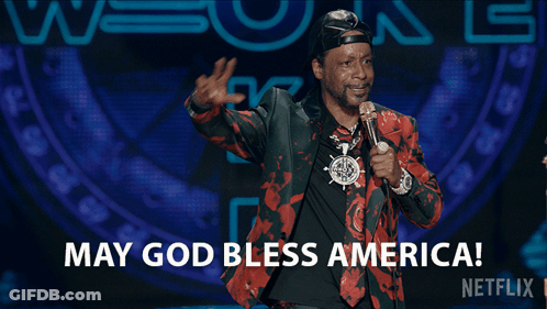 Man At Microphone Saying May God Bless America GIF