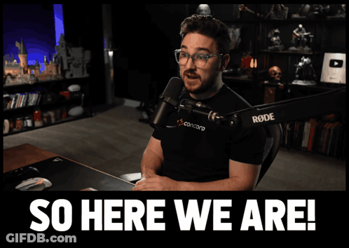 Man At Microphone Saying So Here We Are GIF