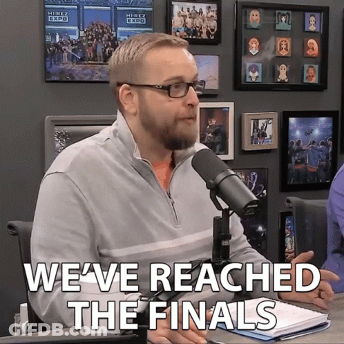 Man At Microphone Saying We've Reached The Finals GIF