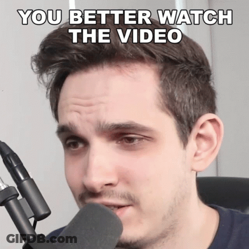 Man At Microphone Saying You Better Watch The Video GIF