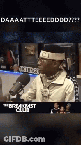 Man At Microphone Wearing Gucci Headband GIF