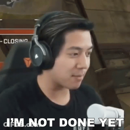Man At Microphone With Headphones Says I'm Not Done Yet GIF