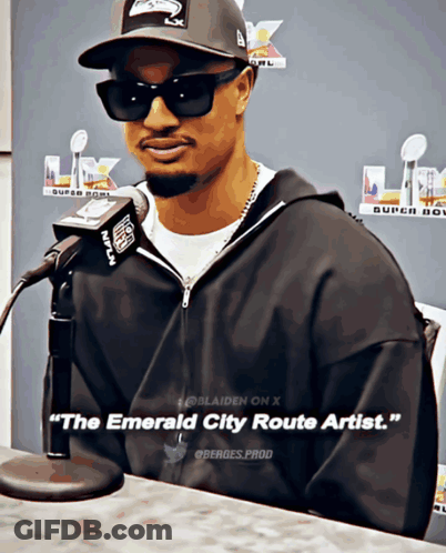 Man At Microphone With The Emerald City Route Artist GIF