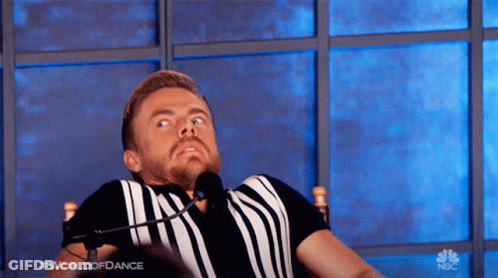 Man At Microphone With #WorldOfDance Shirt GIF