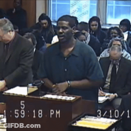 Man At Podium At 5:59 PM GIF