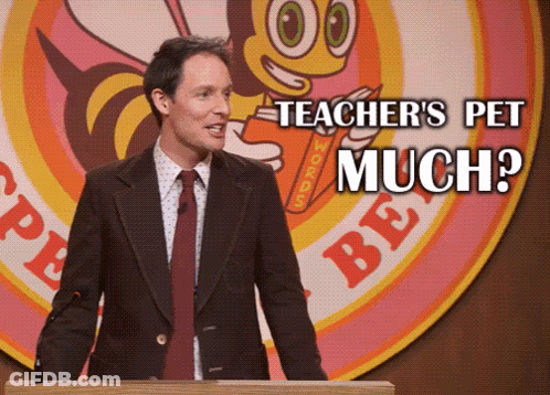 Man At Podium Saying Teacher's Pet Much GIF