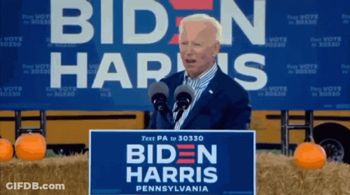 Man At Podium With Biden Harris Pennsylvania Sign GIF