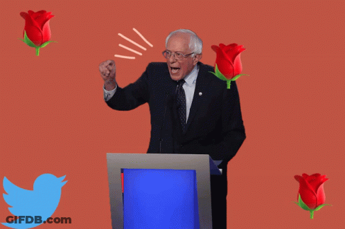 Man At Podium With Fist In Air GIF