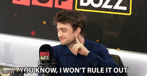 Man At Pop Buzz Mic Says You Know I Won't Rule It Out GIF