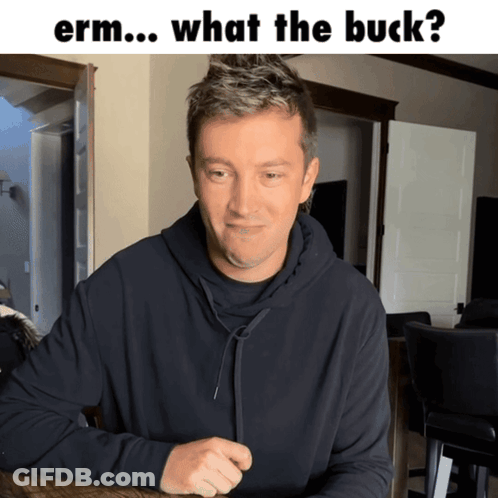 Man At Table Saying Erm What The Buck GIF