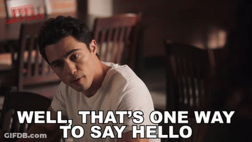 Man At Table Saying Well That's One Way To Say Hello GIF