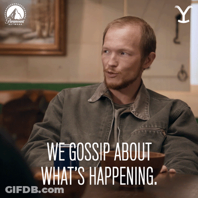 Man At Table We Gossip About What's Happening GIF