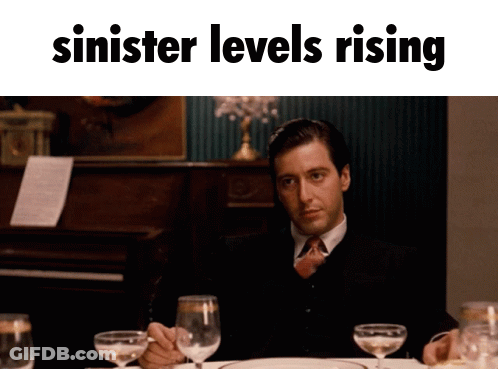 Man At Table With Wine Glasses Sinister Levels Rising GIF