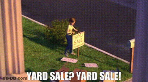 Man At Yard Sale Sign GIF