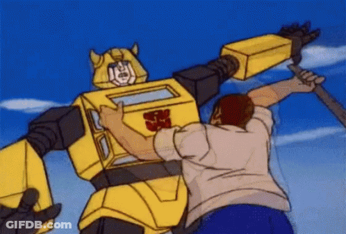 Man Attacked By Transformer Robot GIF
