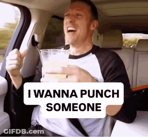Man Back Seat Holding Drink Saying I Wanna Punch Someone GIF