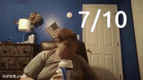 Man Before Blue Wall With 7 And 10 GIF