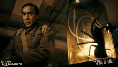 Man Before Glass Dome Spider Noir GIF