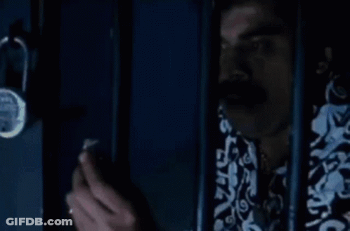 Man Behind Bars Saying I Am Trapped GIF