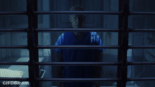 Man Behind Bars With It's Coming GIF