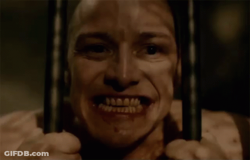 Man Behind Bars With Open Mouth GIF