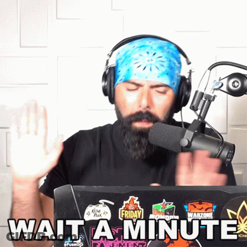 Man Behind Laptop Saying Wait A Minute GIF