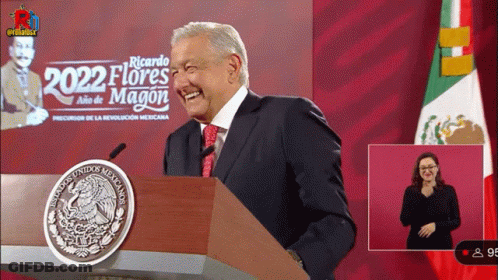 Man Behind Podium Saying 2022 Flores Magon GIF