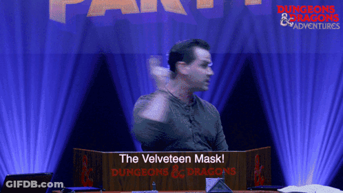 Man Behind Podium Saying The Velveteen Mask GIF