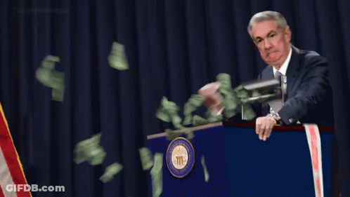 Man Behind Podium With Money Falling GIF
