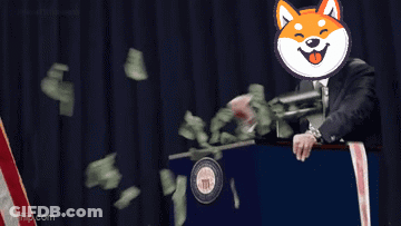 Man Behind Podium With Shiba Inu On Head GIF