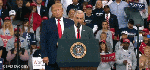 Man Behind Podium With US Seal GIF