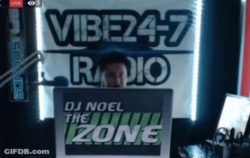 Man Behind Vibe247 Radio Sign GIF