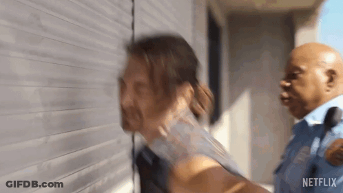 Man Being Arrested By Police Officer GIF
